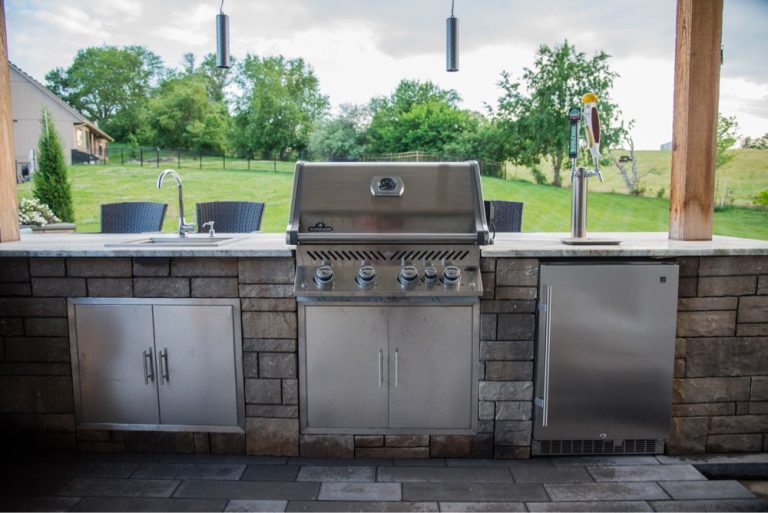 Finished residential outdoor kitchen and lawn